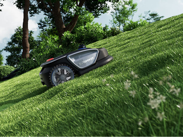 Sunseeker S4 robot lawn mower on complex grass yard